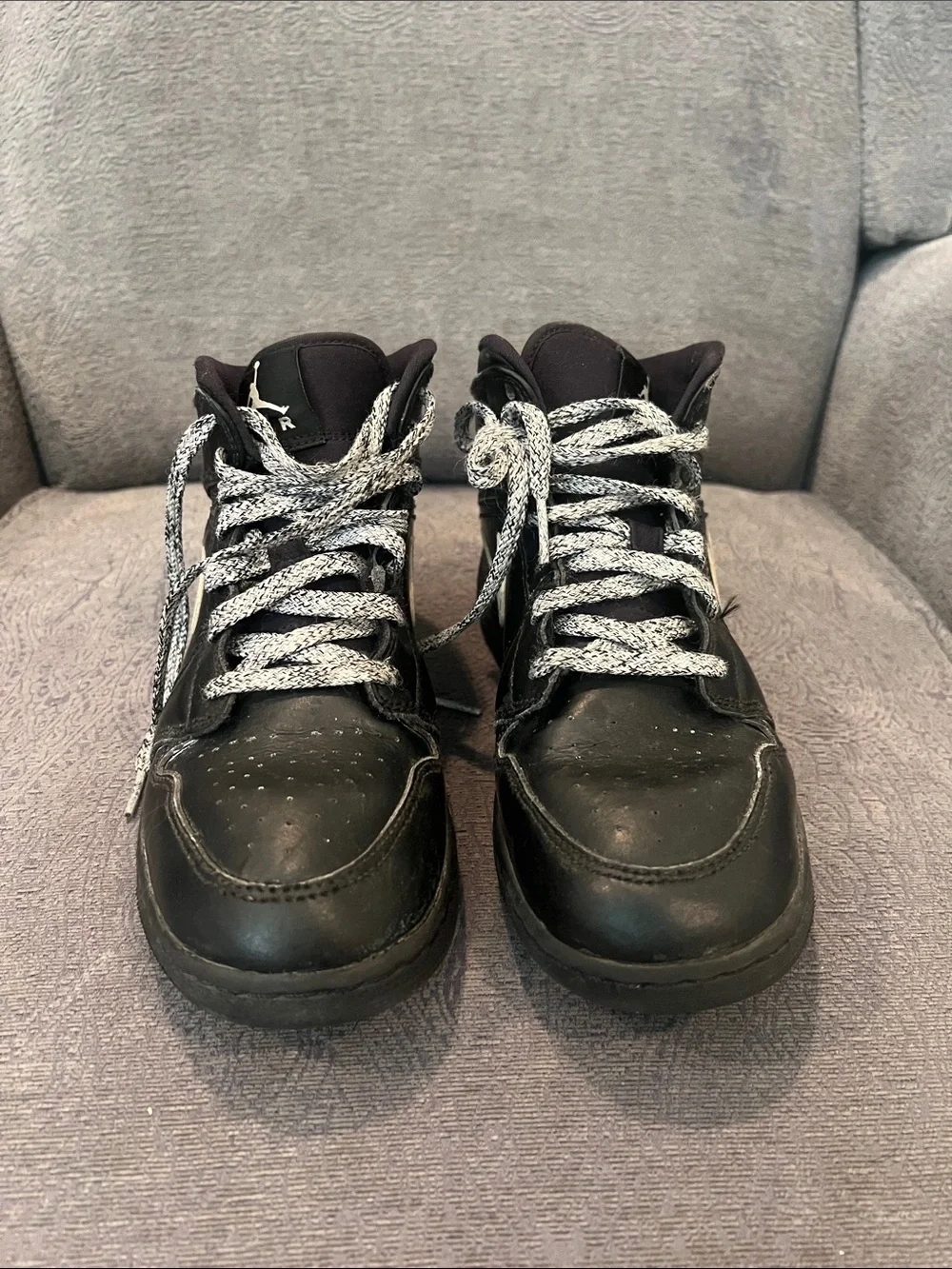 Nike Kids Black High-Top Sneakers with White Swoosh